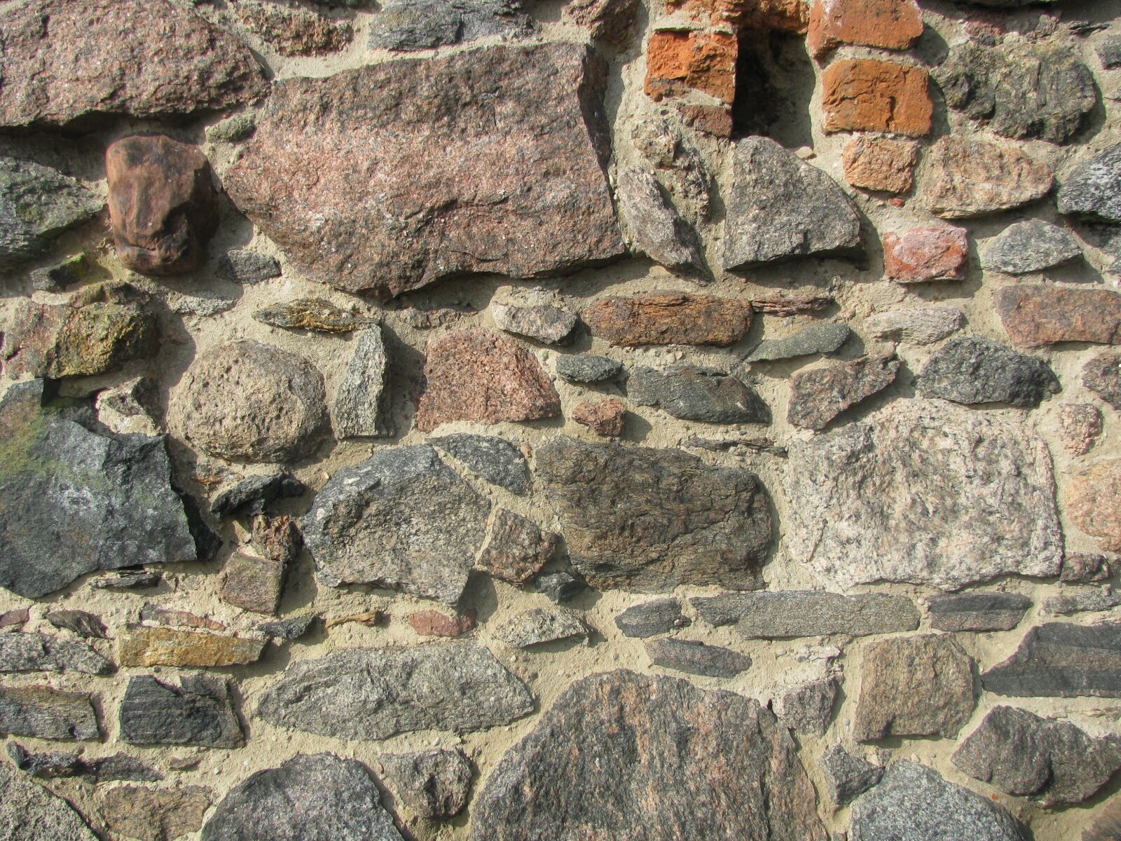 Canon POWERSHOT SX100 IS sample photo. The stones, castle wall photography