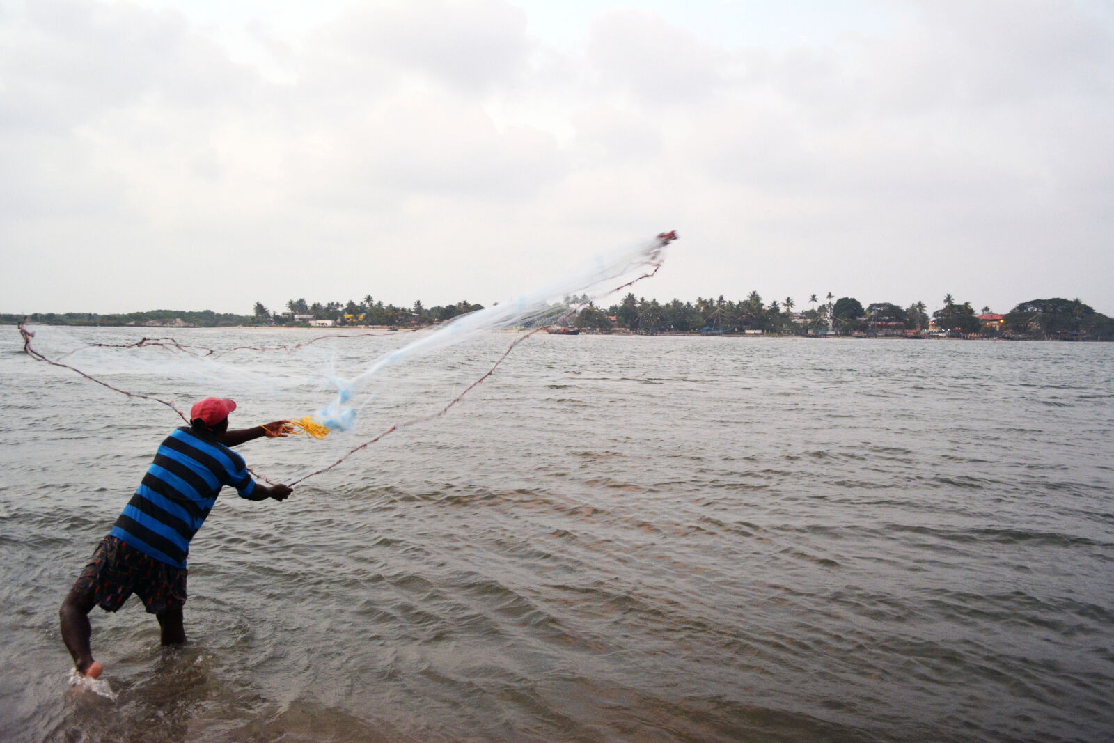 Nikon D5200 sample photo. Back, fisherman, sea, water photography