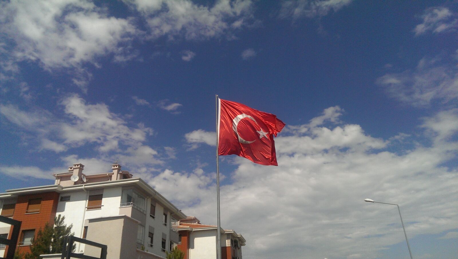 HTC ONE sample photo. Turkey, flag, under, blue photography