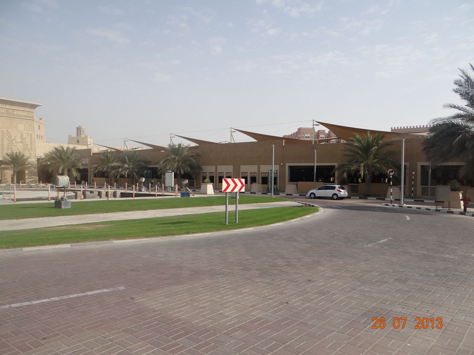 Sony DSC-HX200V sample photo. Road, parking lot, dubai photography