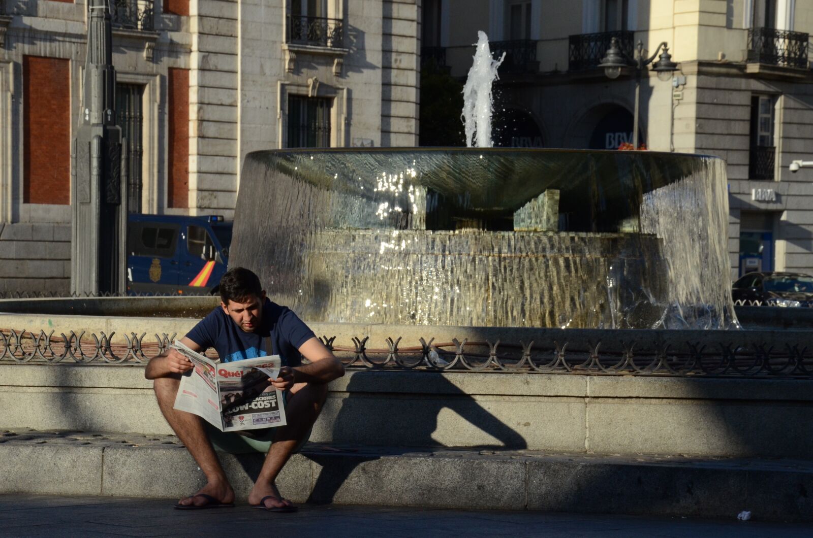 Nikon D7000 sample photo. Boy reading newspaper, newspaper photography