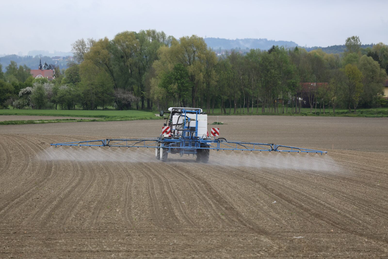 Canon EF 100-400mm F4.5-5.6L IS USM sample photo. Tractor, agriculture, field photography