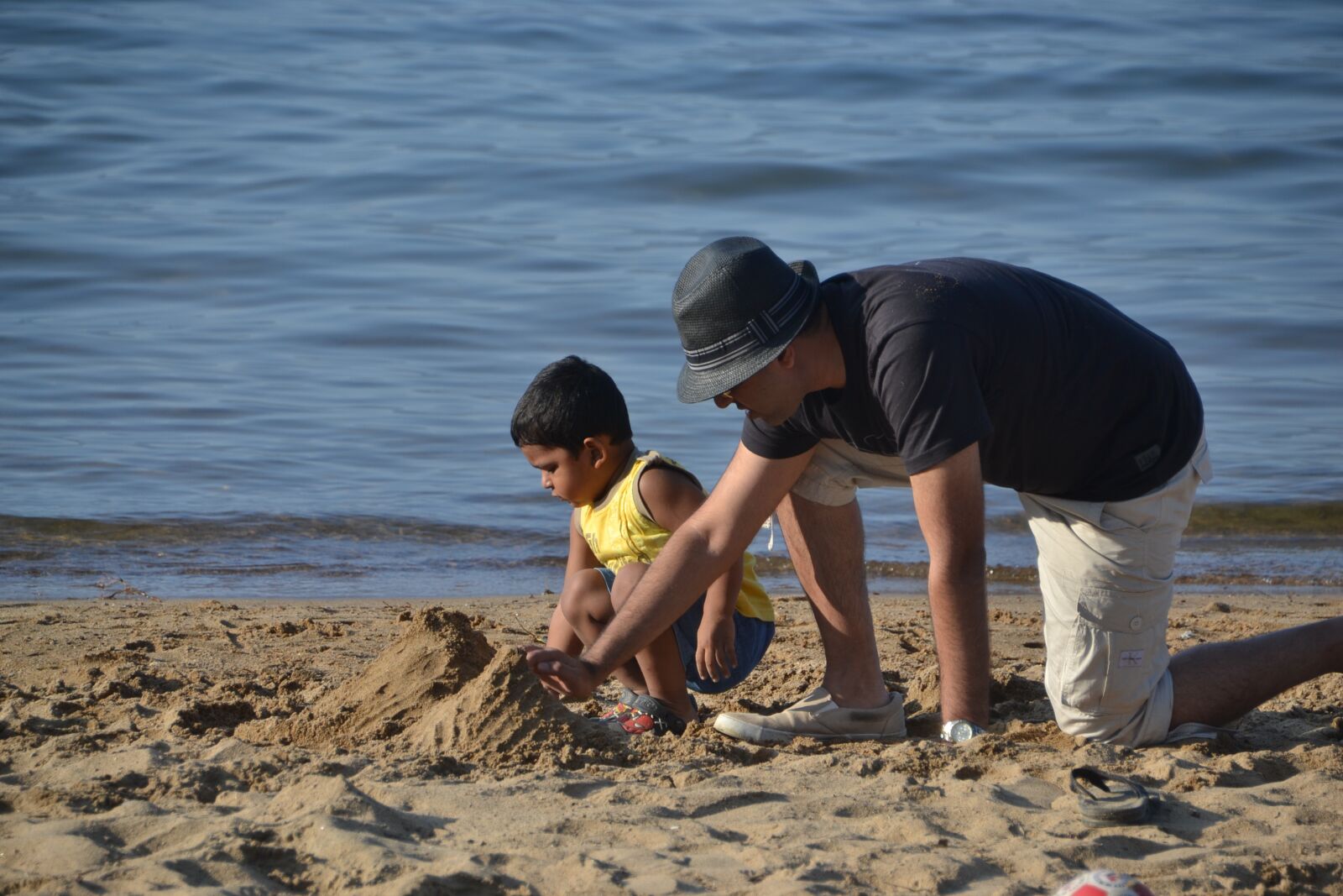 Nikon D3100 sample photo. Dad, son sand, sand photography