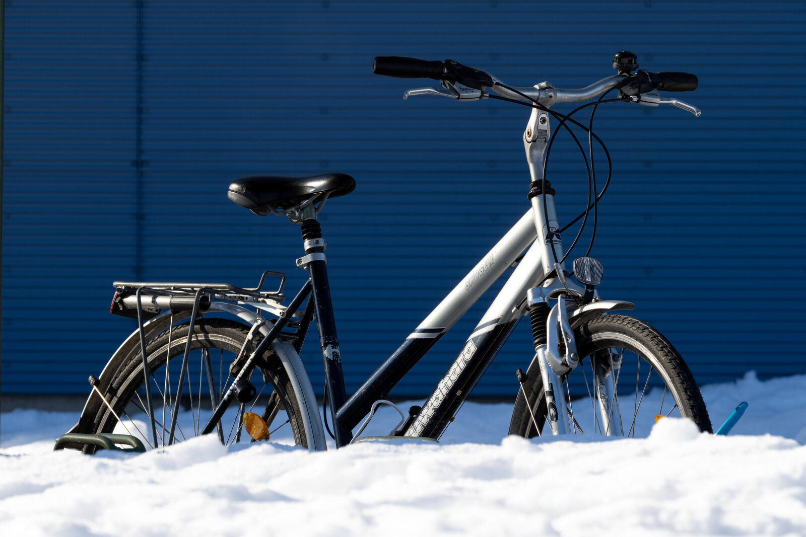 OM System 40-150mm F4.0 PRO sample photo. Snow covered bicycle photography