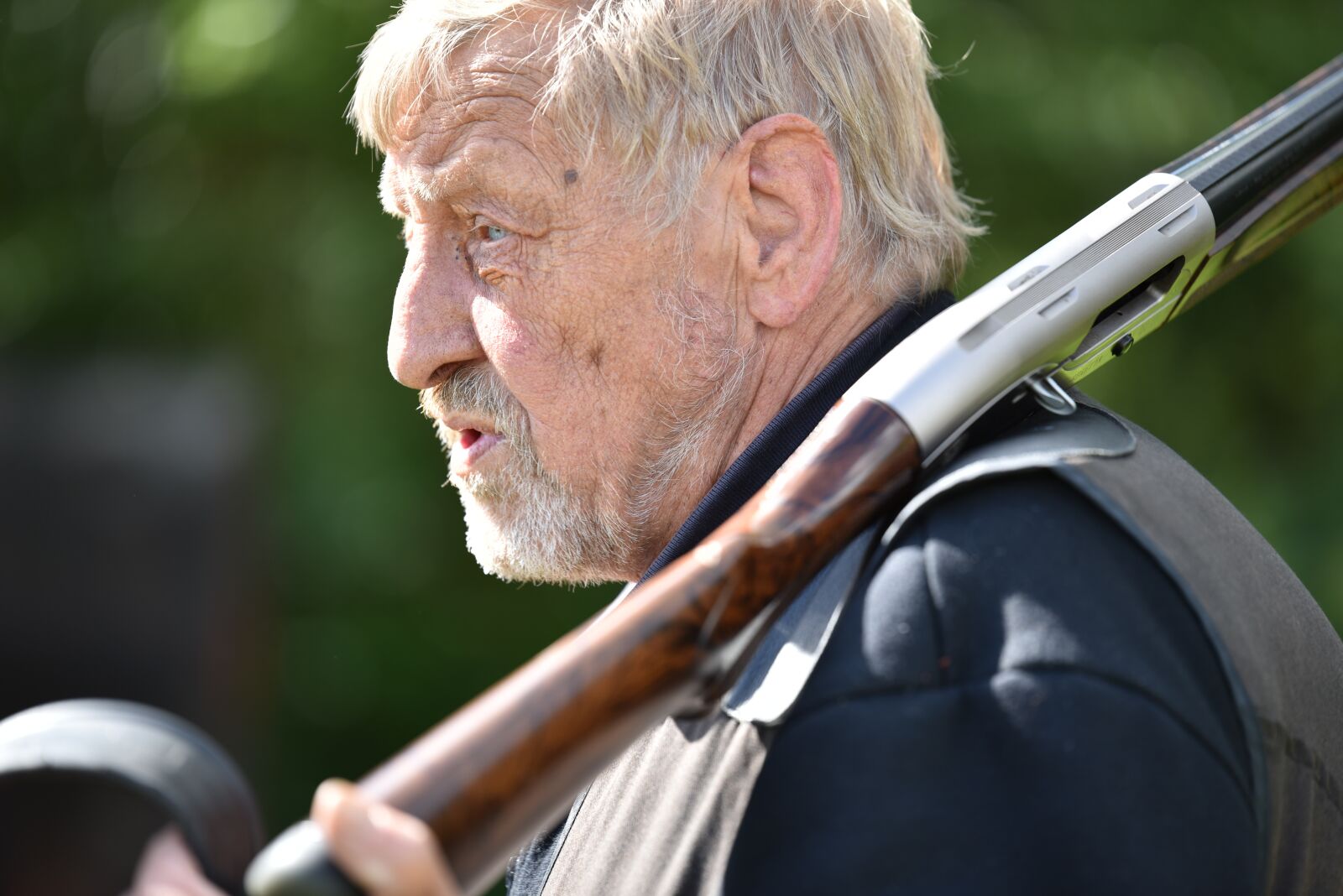 Nikon D810 sample photo. Man, older, rifle photography