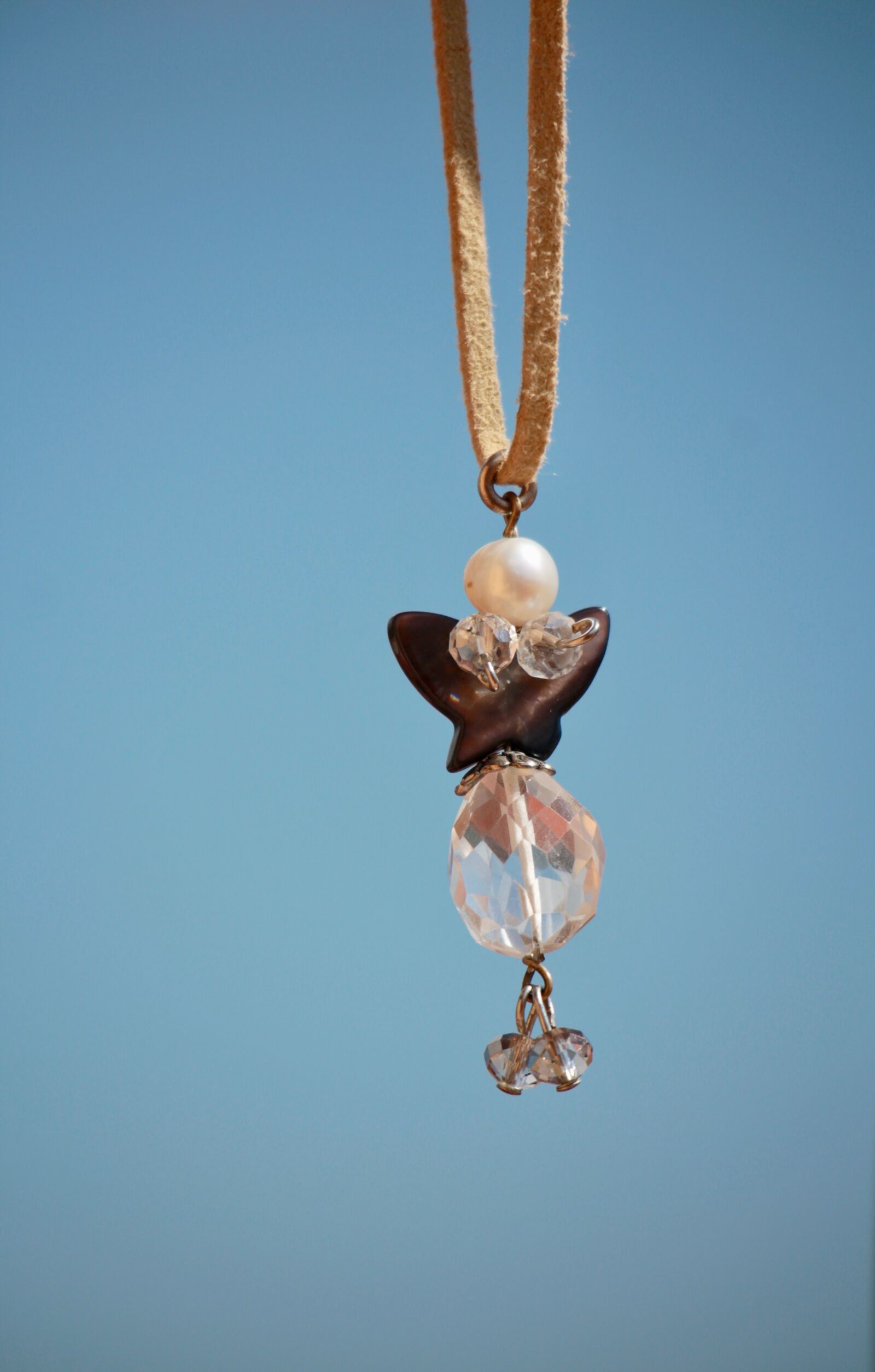 Canon EOS M sample photo. Pendant, necklace, fly photography