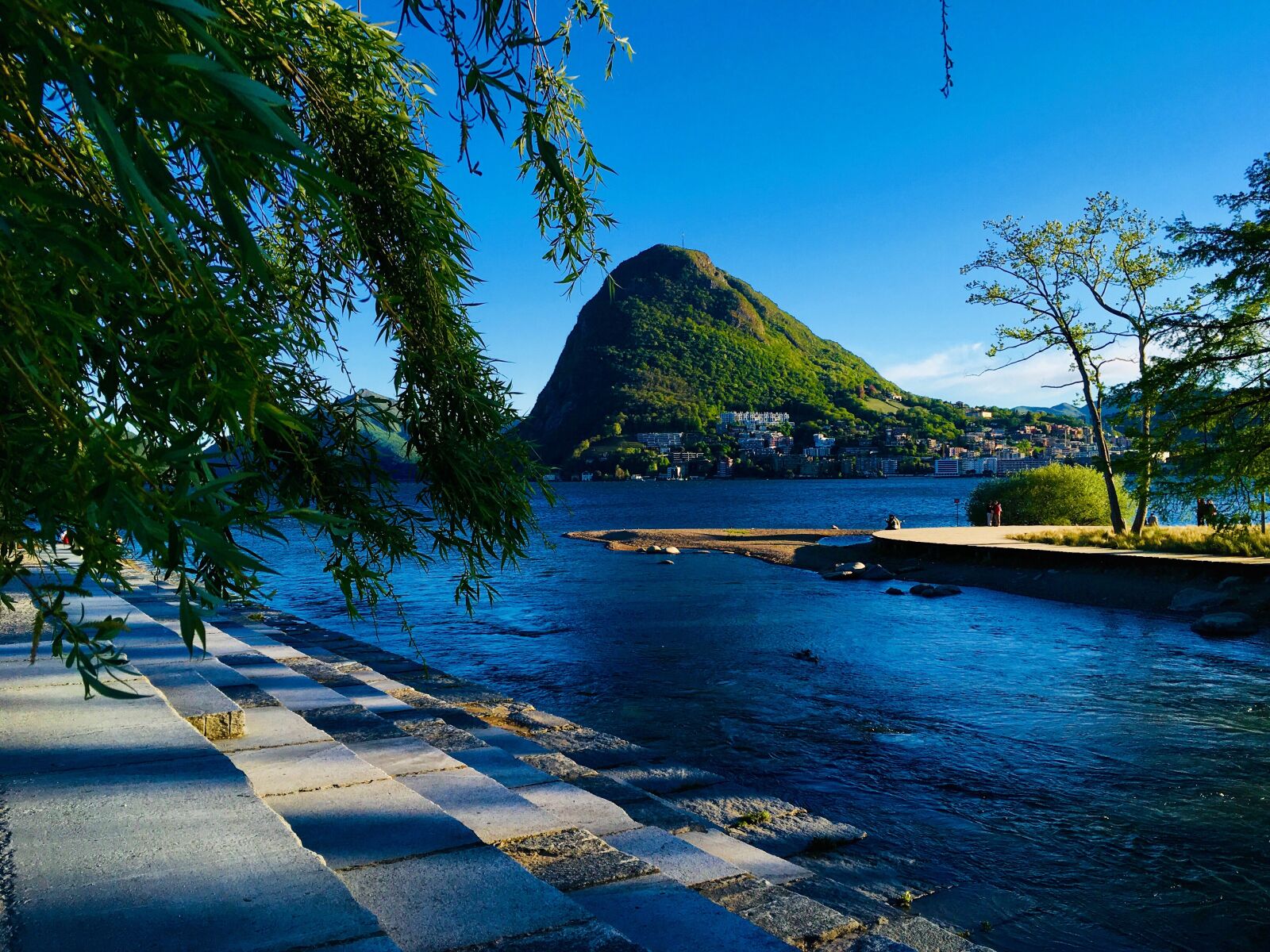 iPhone SE back camera 4.15mm f/2.2 sample photo. Lugano, lago, fiume photography