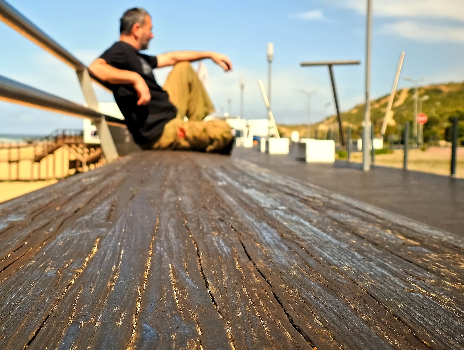 Nikon Coolpix P900 sample photo. Man, sitting, alone photography
