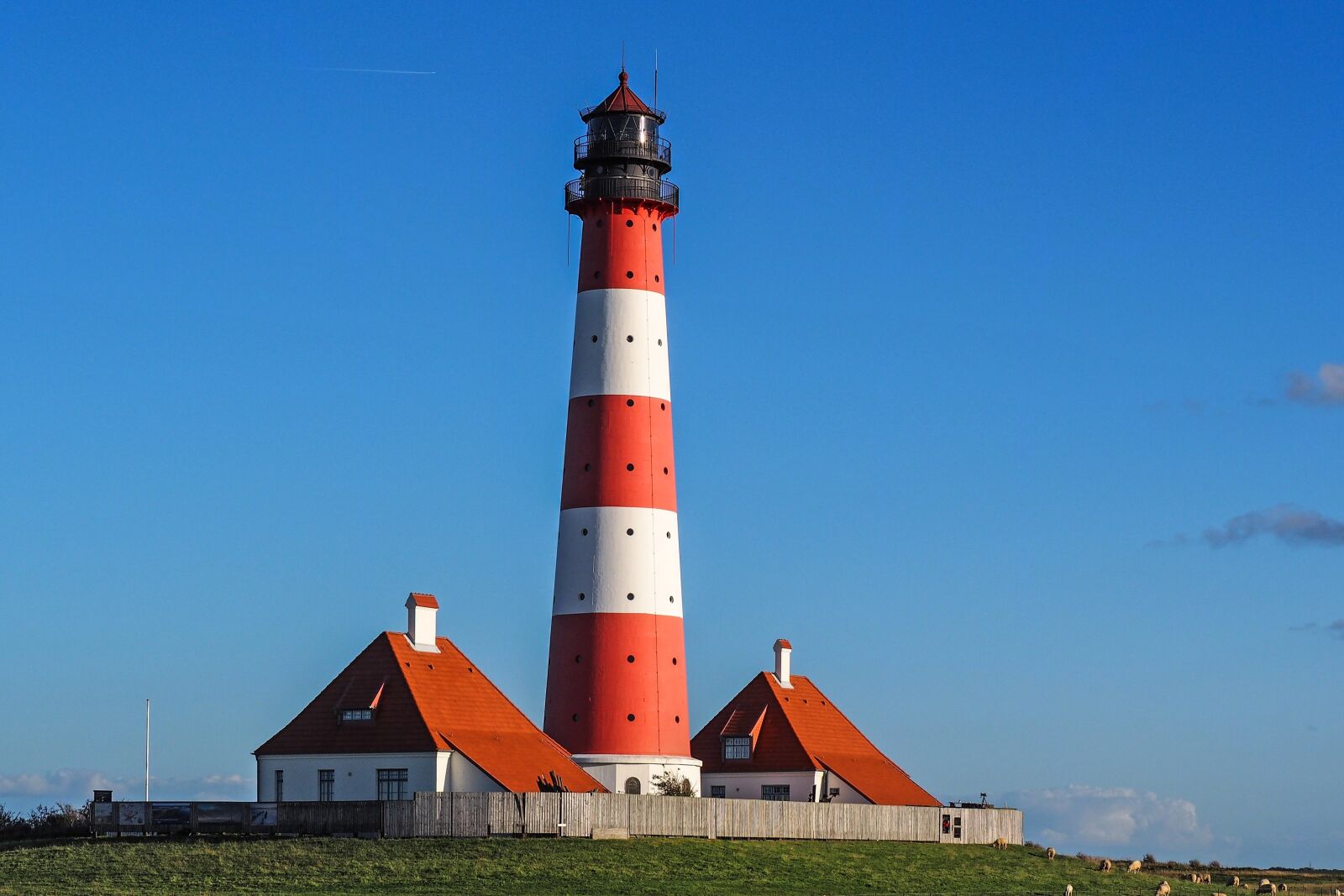 Olympus OM-D E-M10 sample photo. Lighthouse, westerhever, wadden sea photography