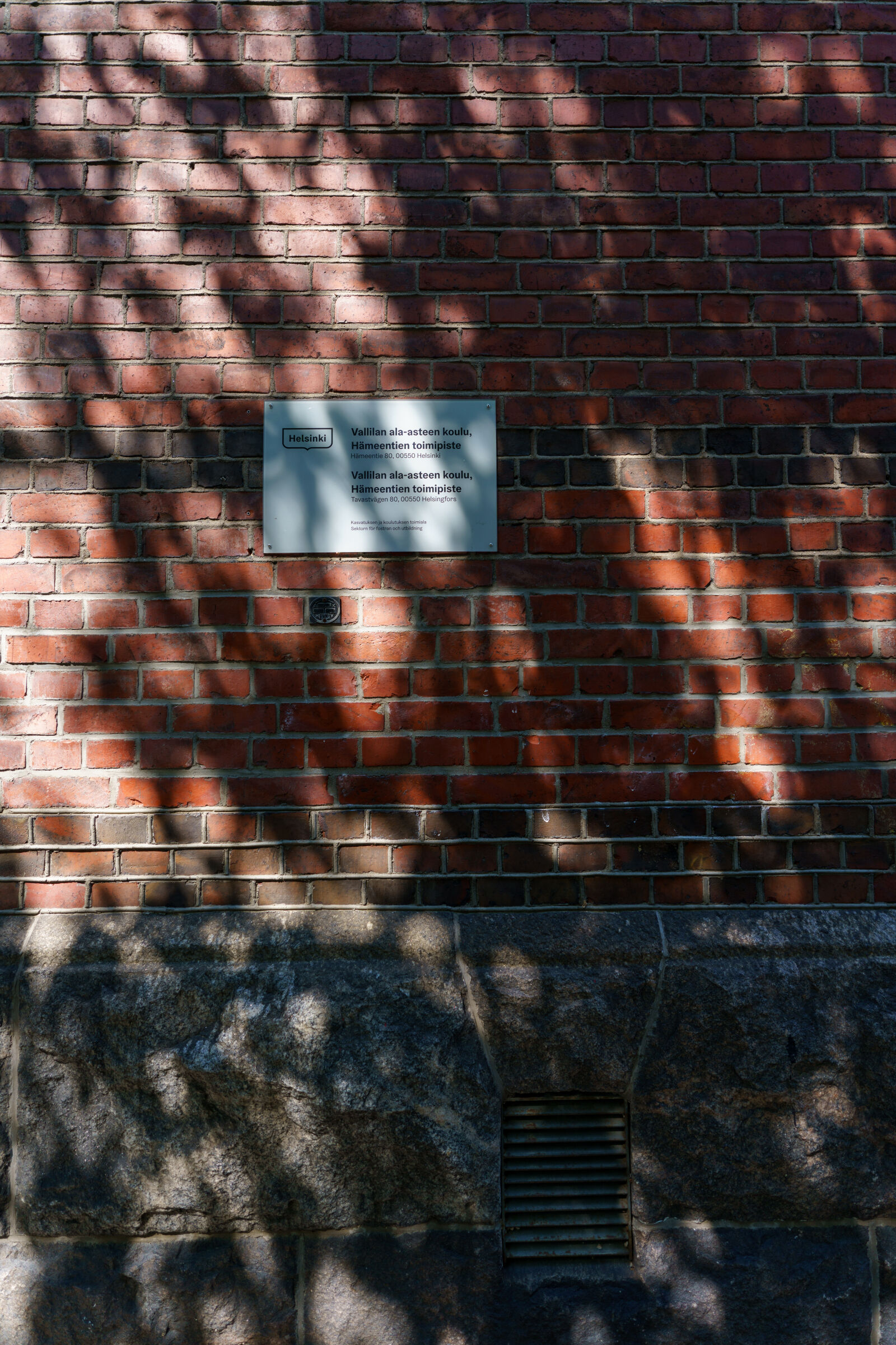 Sigma 17mm F4 DG DN | C sample photo. Sign at shadows photography