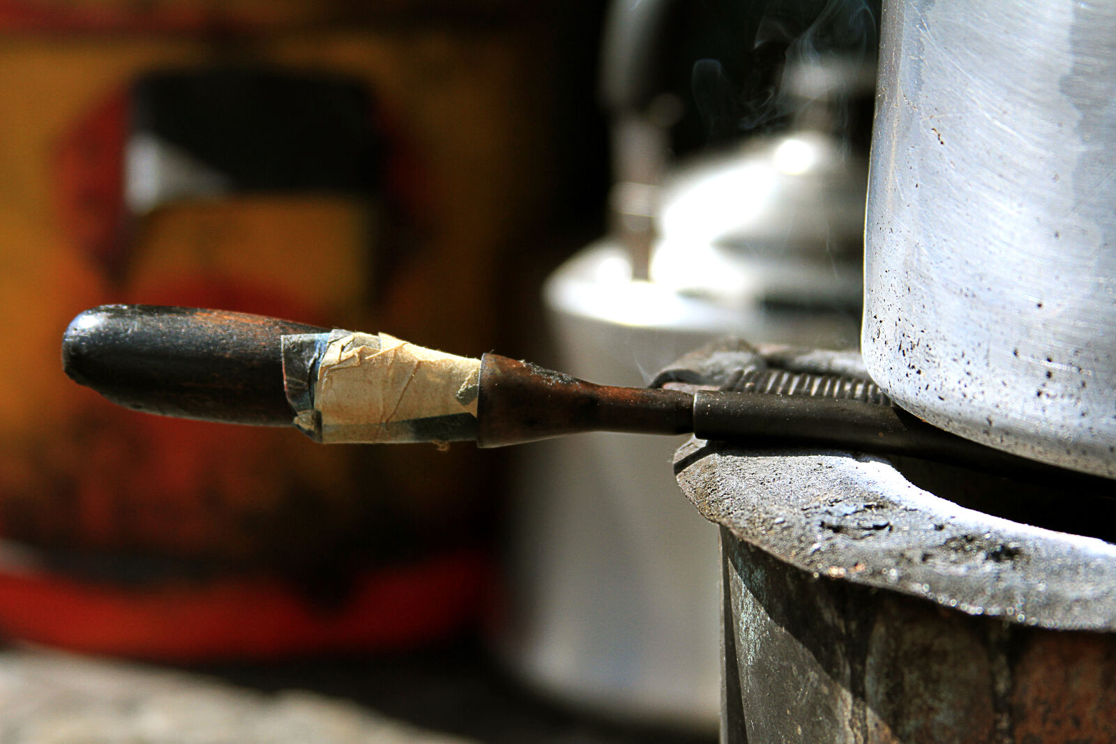 Canon EF 28-135mm F3.5-5.6 IS USM sample photo. Africa, broken, charcoal, comb photography