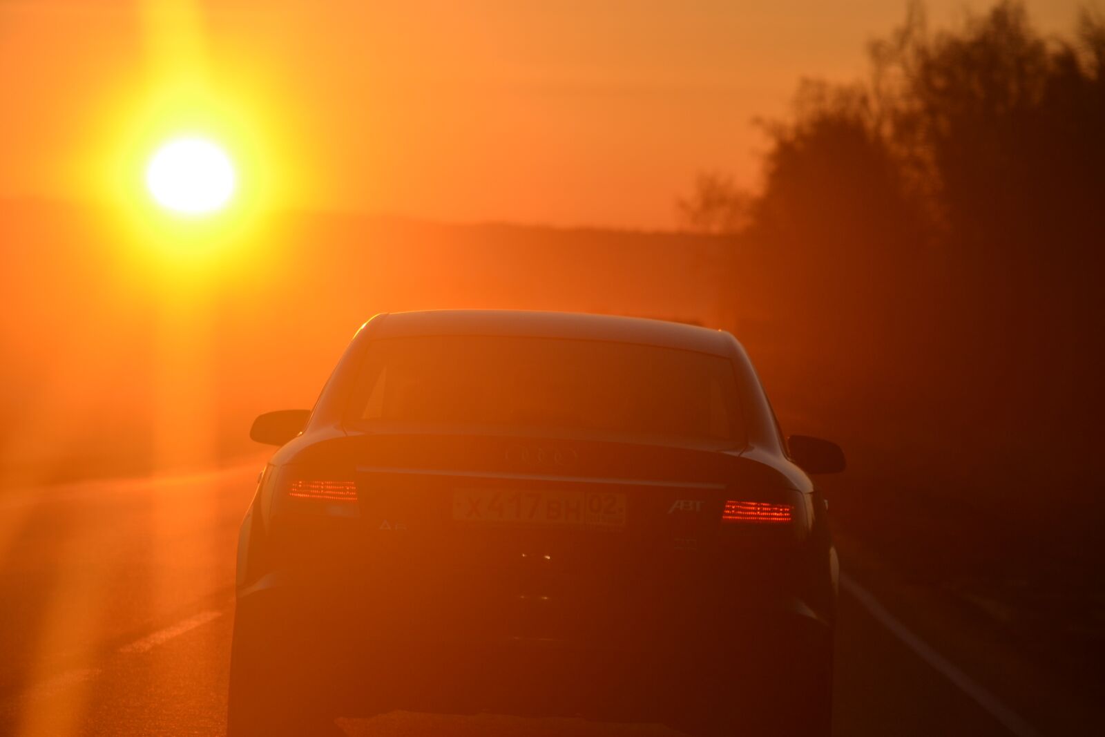 Nikon D3100 sample photo. Sunset, car, sun photography
