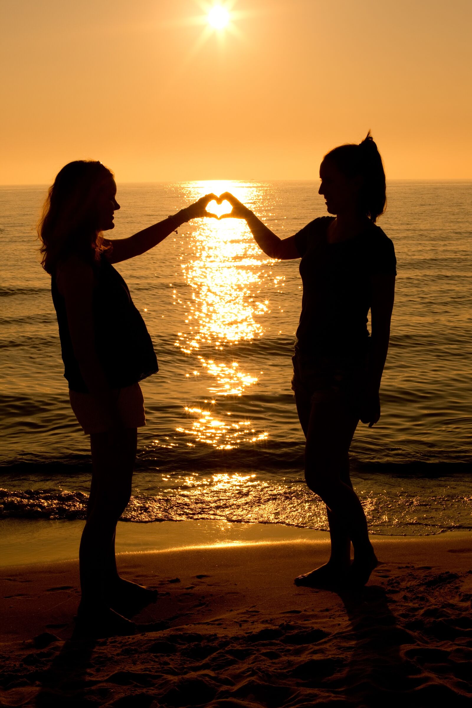 Canon EOS 5D Mark III sample photo. Sunset, heart, two women photography