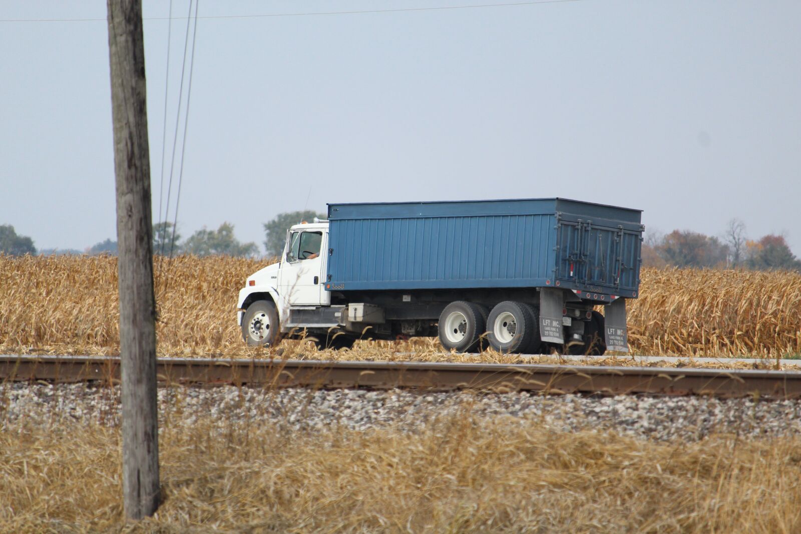 Canon EF-S 55-250mm F4-5.6 IS STM sample photo. Grain, railroad, truck photography