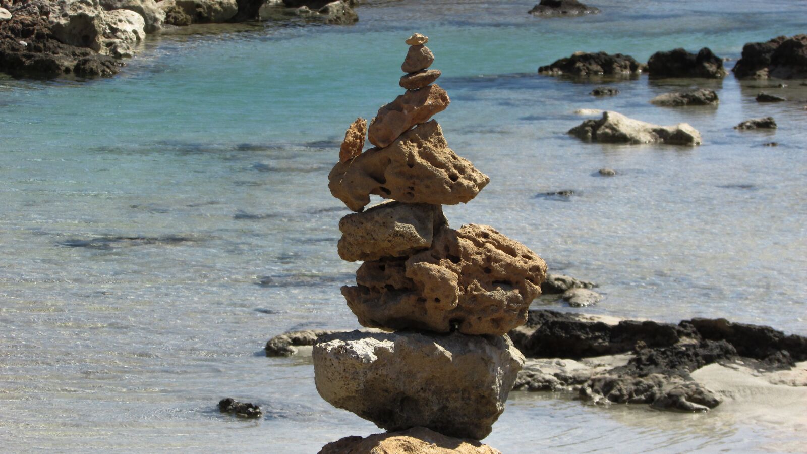 Canon PowerShot SX400 IS sample photo. Stones, beach, sea photography