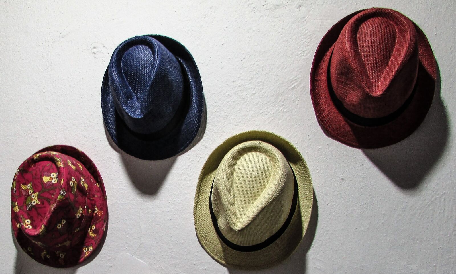 Canon PowerShot SX400 IS sample photo. Hats, wall, shop photography