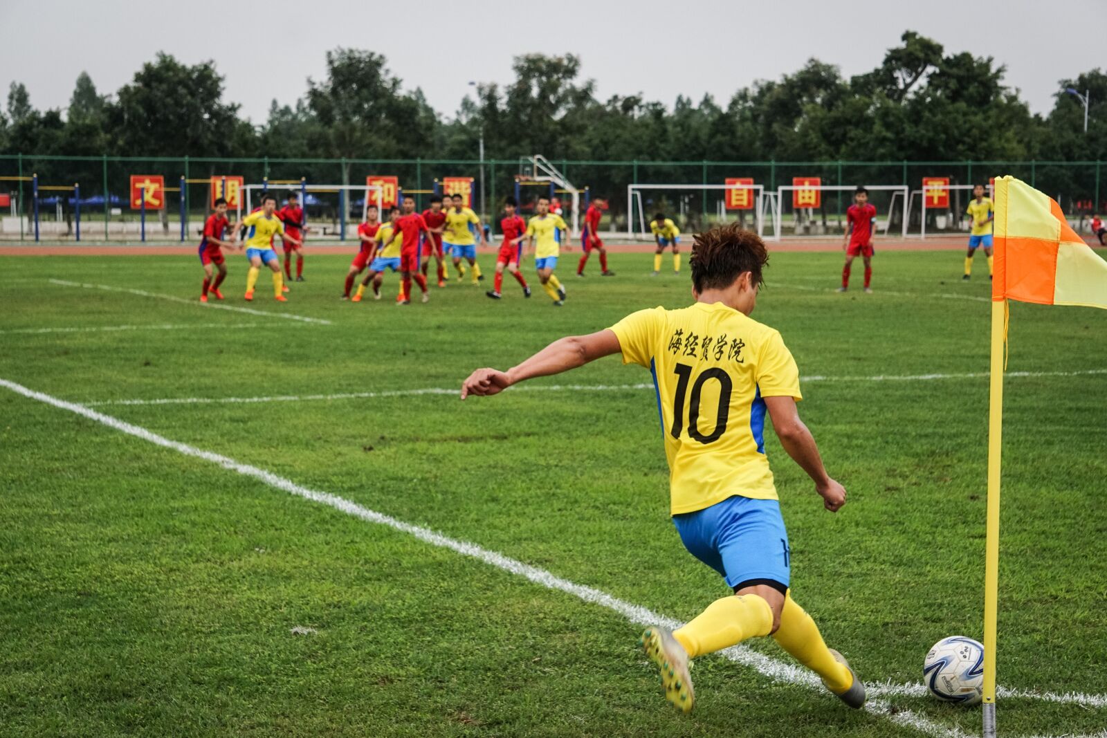 Sony E 55-210mm F4.5-6.3 OSS sample photo. Football, game, sports photography
