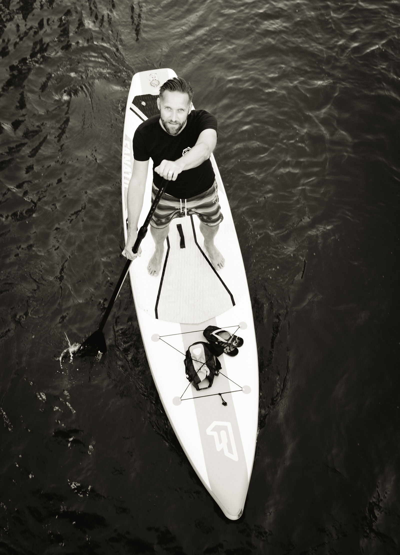 Fujifilm X100T sample photo. Man, standing, on, surfboard photography