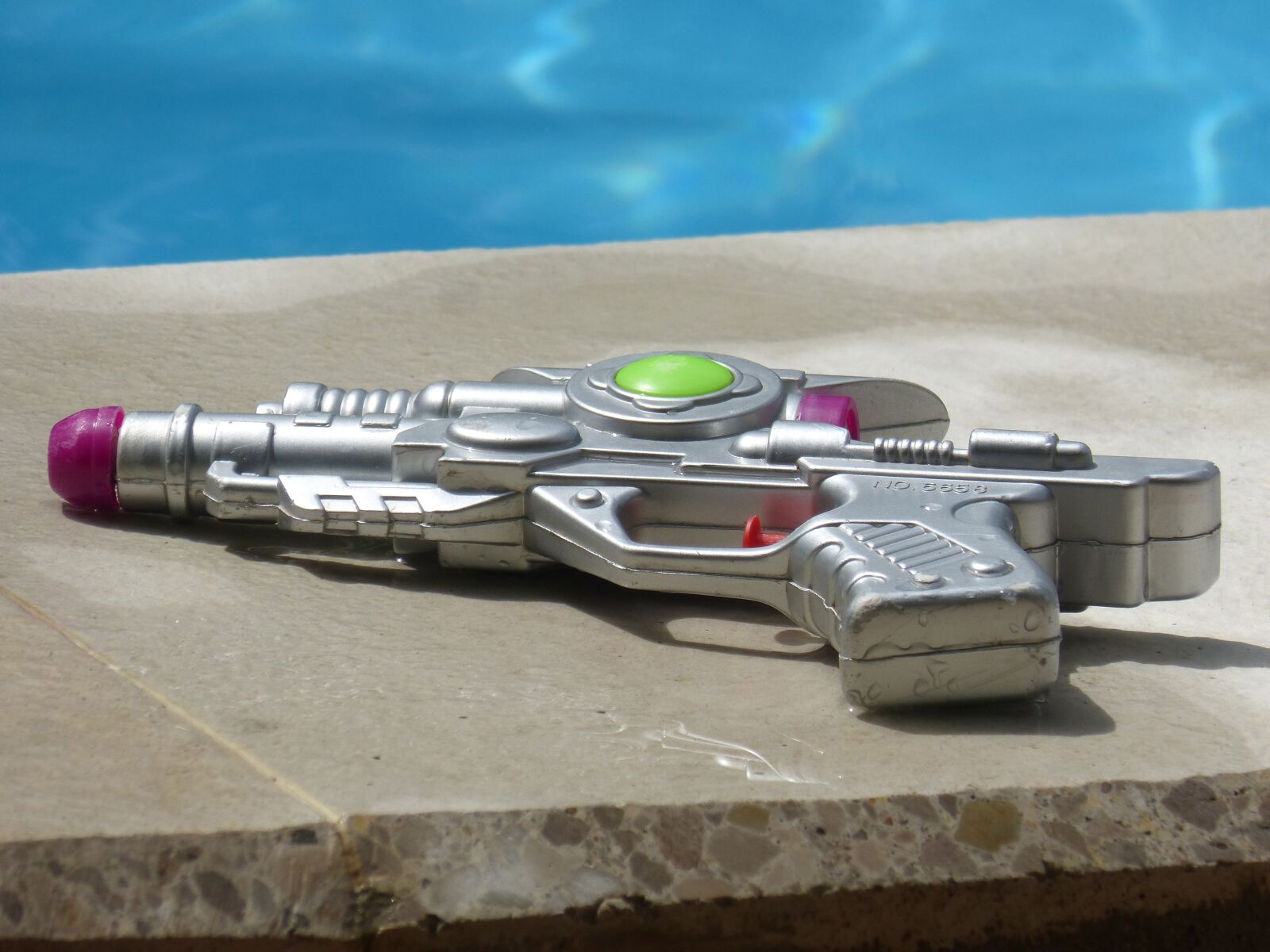 Panasonic DMC-FZ62 sample photo. Toy, water gun, summer photography