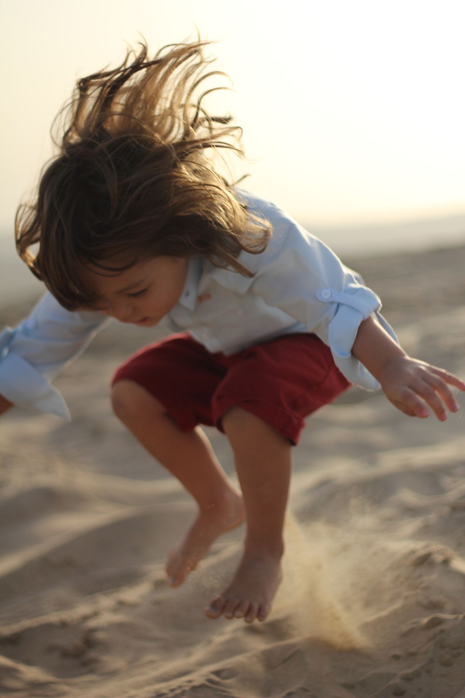 Canon EOS 550D (EOS Rebel T2i / EOS Kiss X4) sample photo. Child, desert, jumping photography
