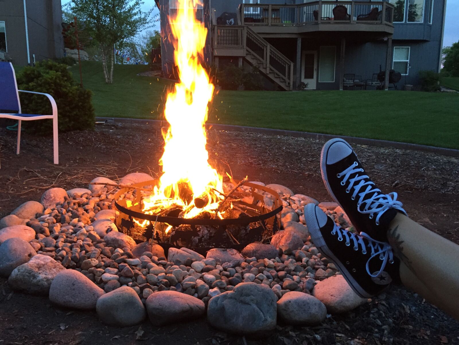 Apple iPhone 6 sample photo. Campfire, sneakers photography