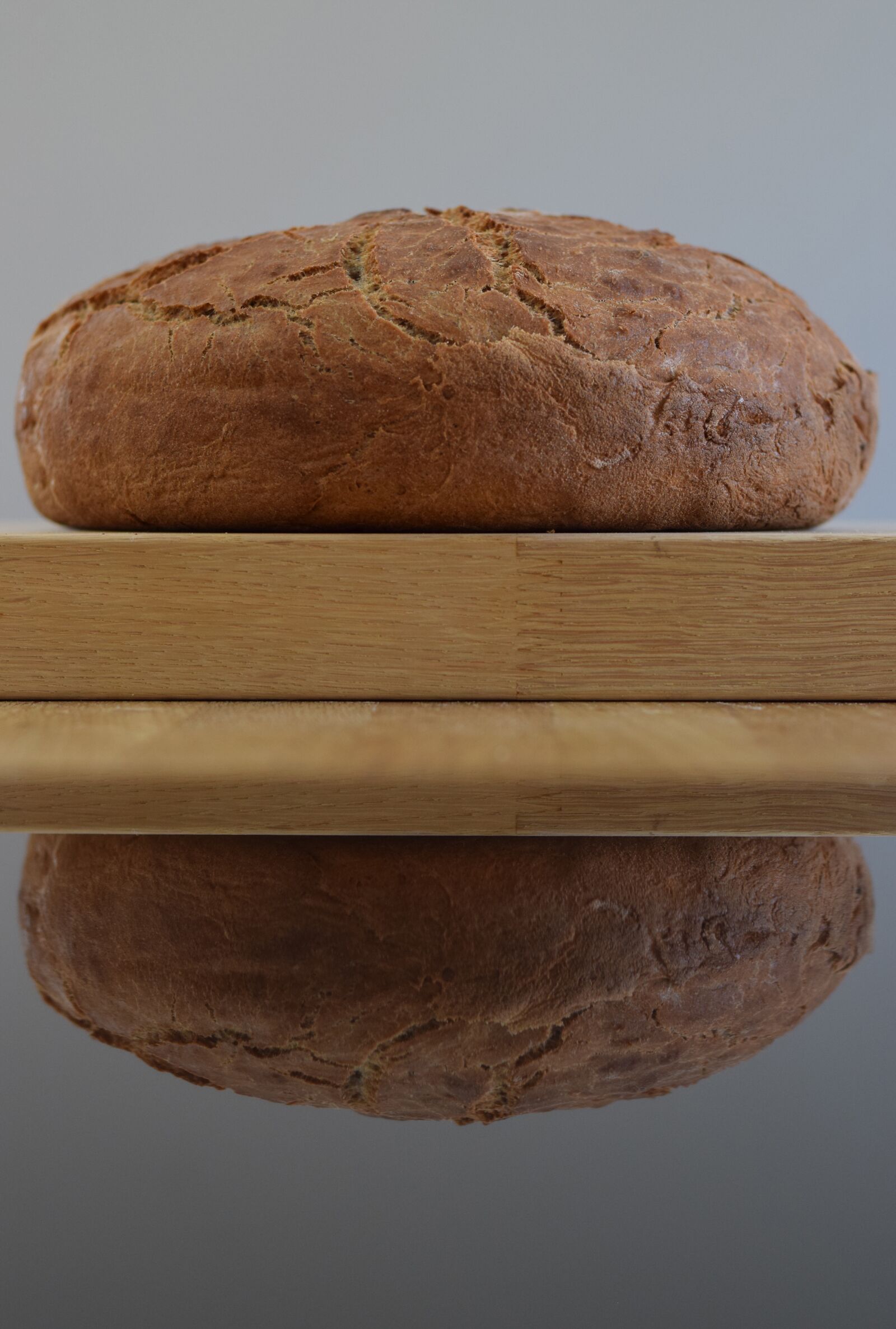 Nikon D5300 sample photo. Bread, wooden board, reflection photography