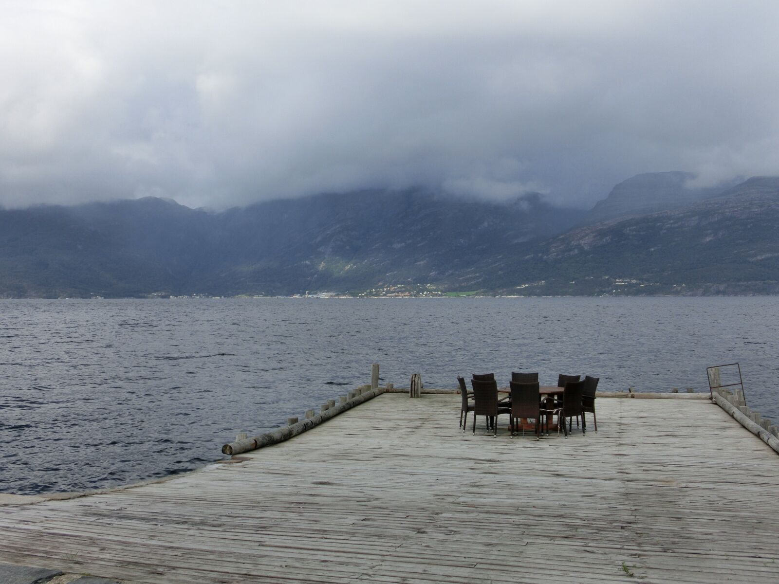 CASIO EX-ZR200 sample photo. Lake, chair seating, wide photography