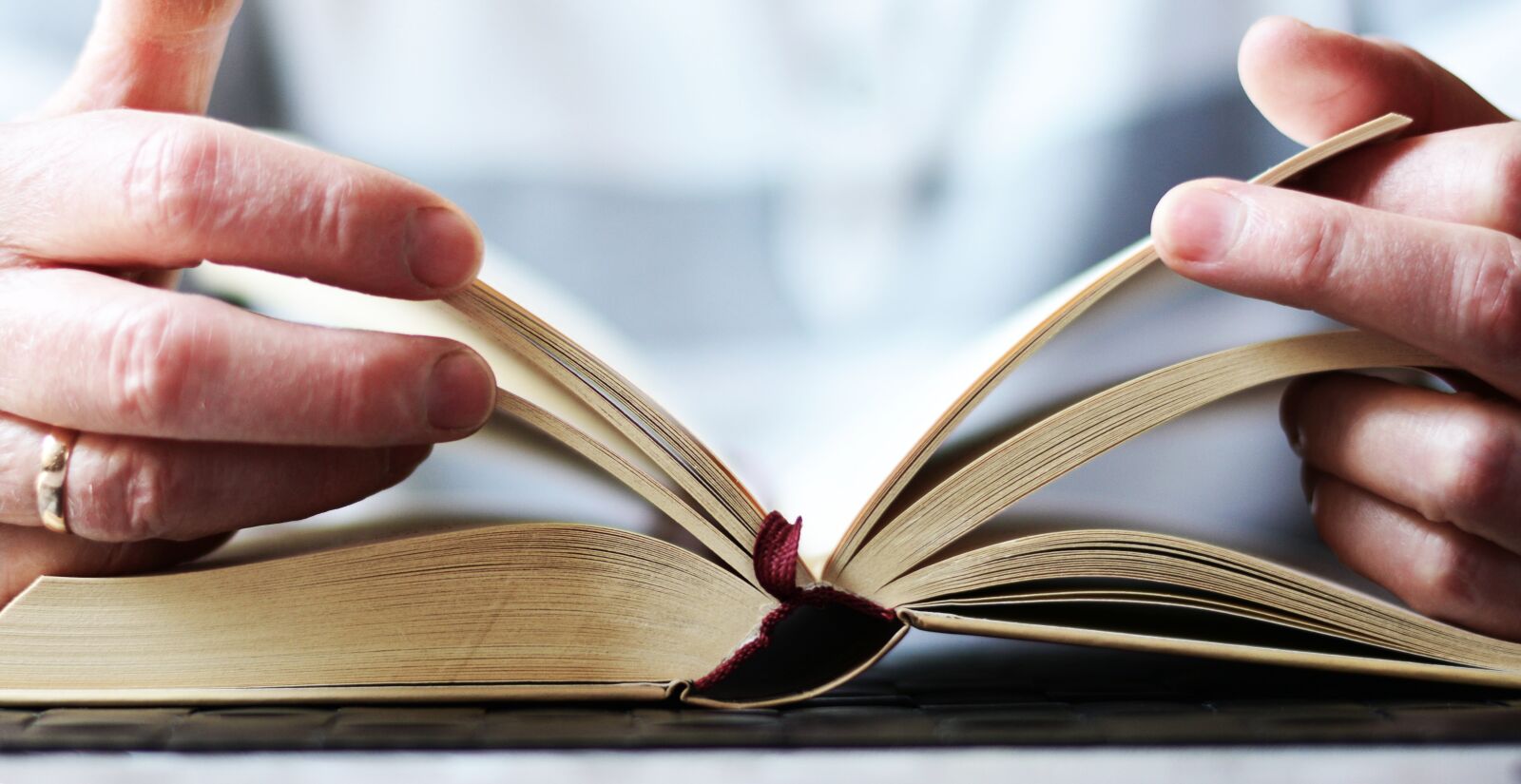 Nikon D5200 sample photo. Hands, book, read photography