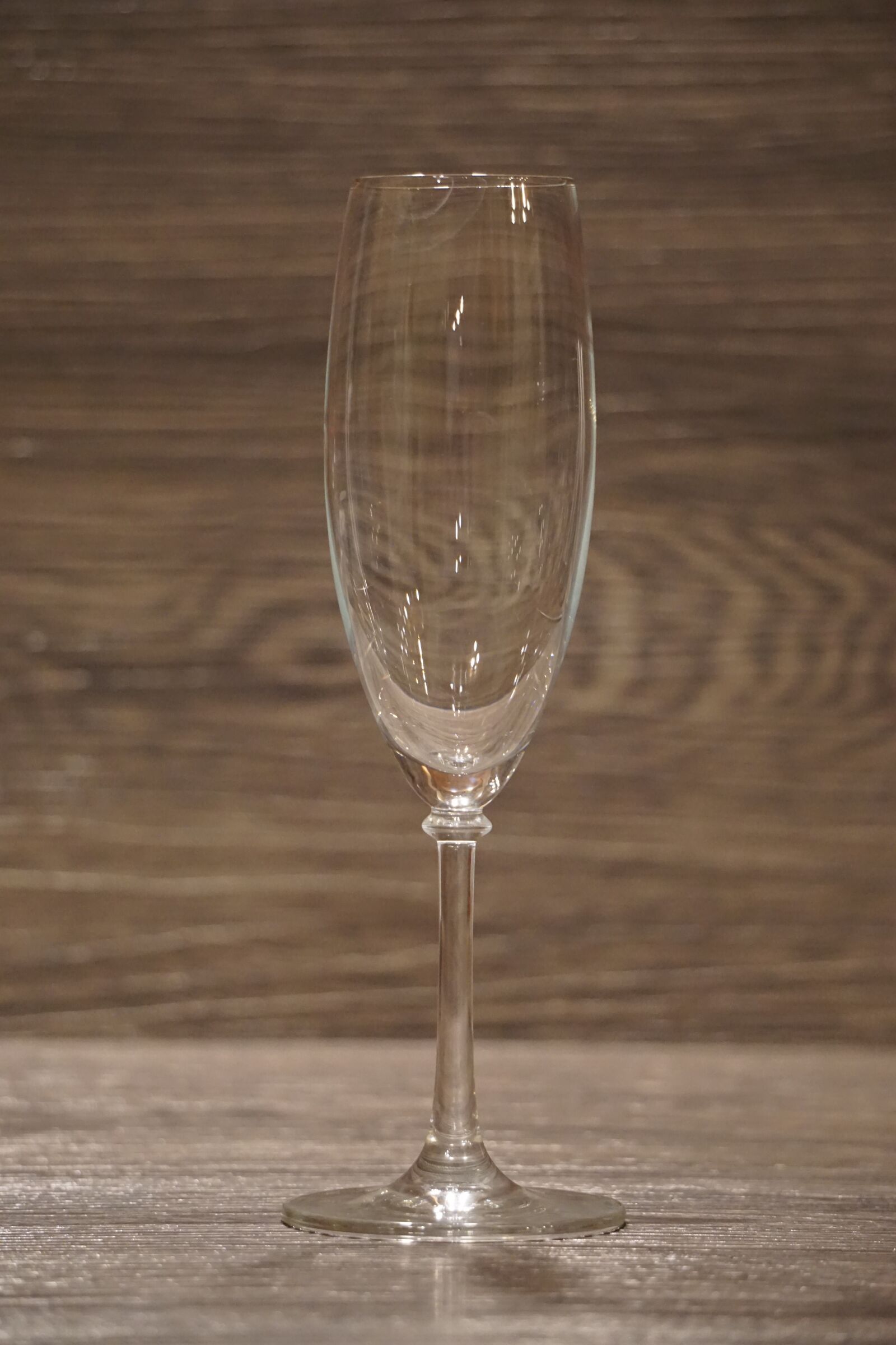 Sony E 55-210mm F4.5-6.3 OSS sample photo. Champagne glass, drink, new photography