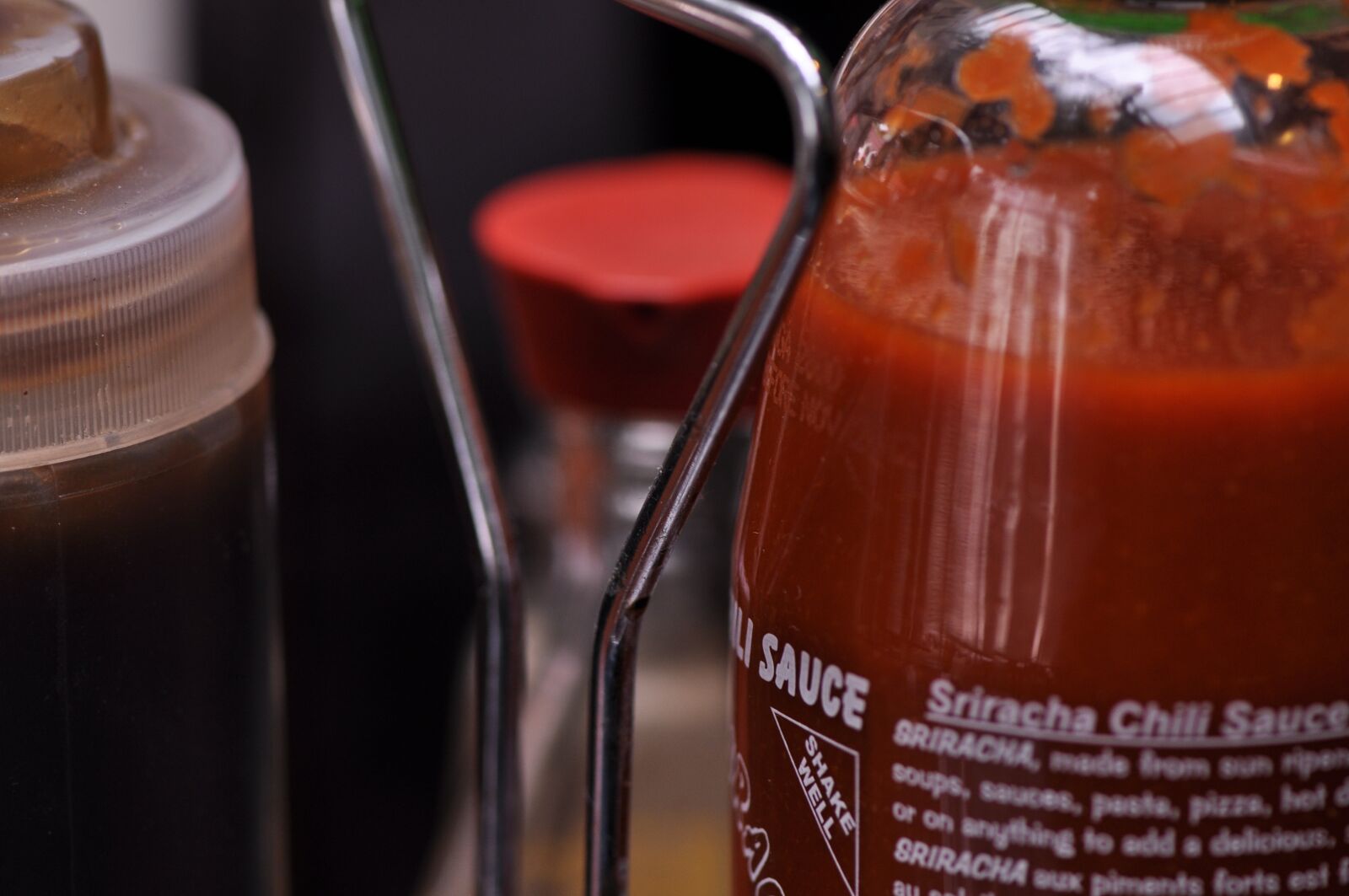 Nikon D90 sample photo. Sriracha, condiments, restaurant photography