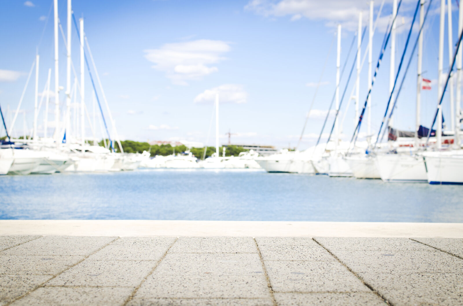 Nikon D5100 + Nikon AF-S DX Nikkor 35mm F1.8G sample photo. Bay, blue, boats, clouds photography