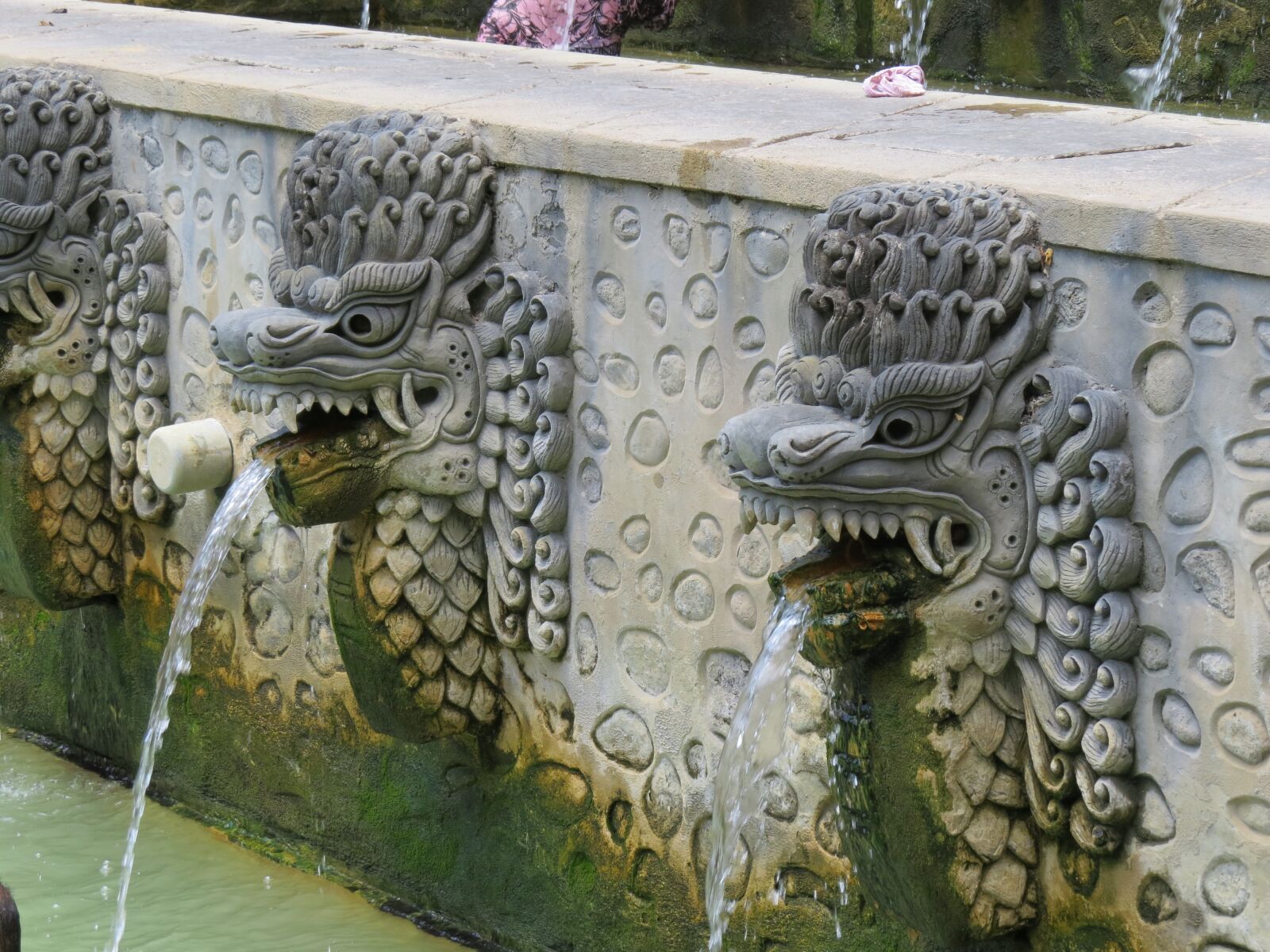Canon PowerShot SX50 HS sample photo. Fountain, lion head, water photography