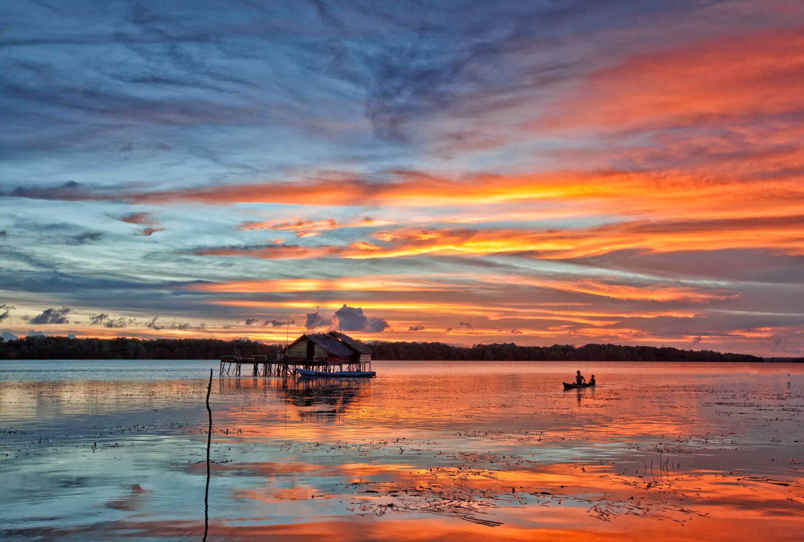 Canon EOS 5D Mark II sample photo. Lagoon, boat, sunset photography