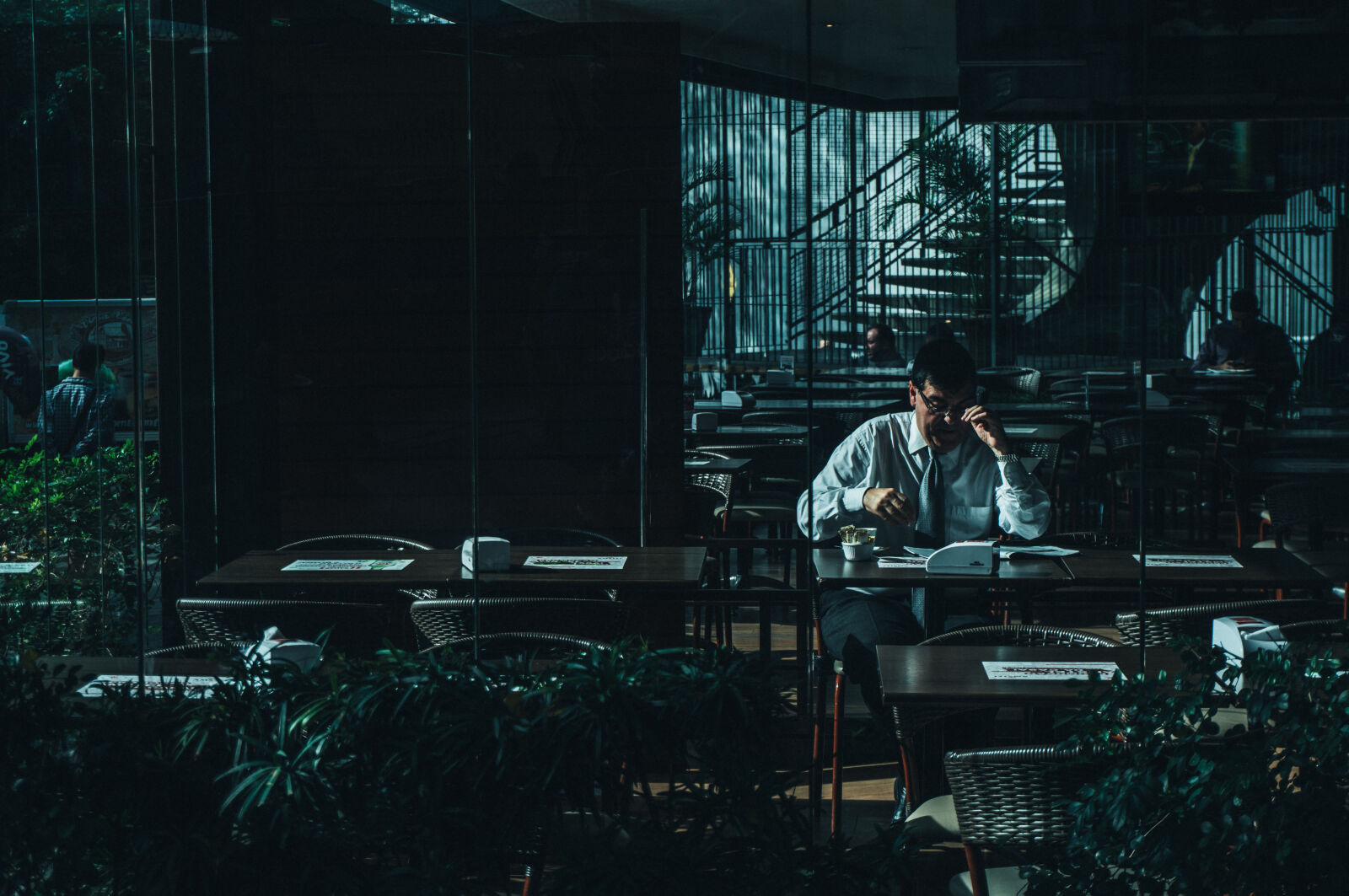 Sony a6300 sample photo. Man, seating, beside, desk photography