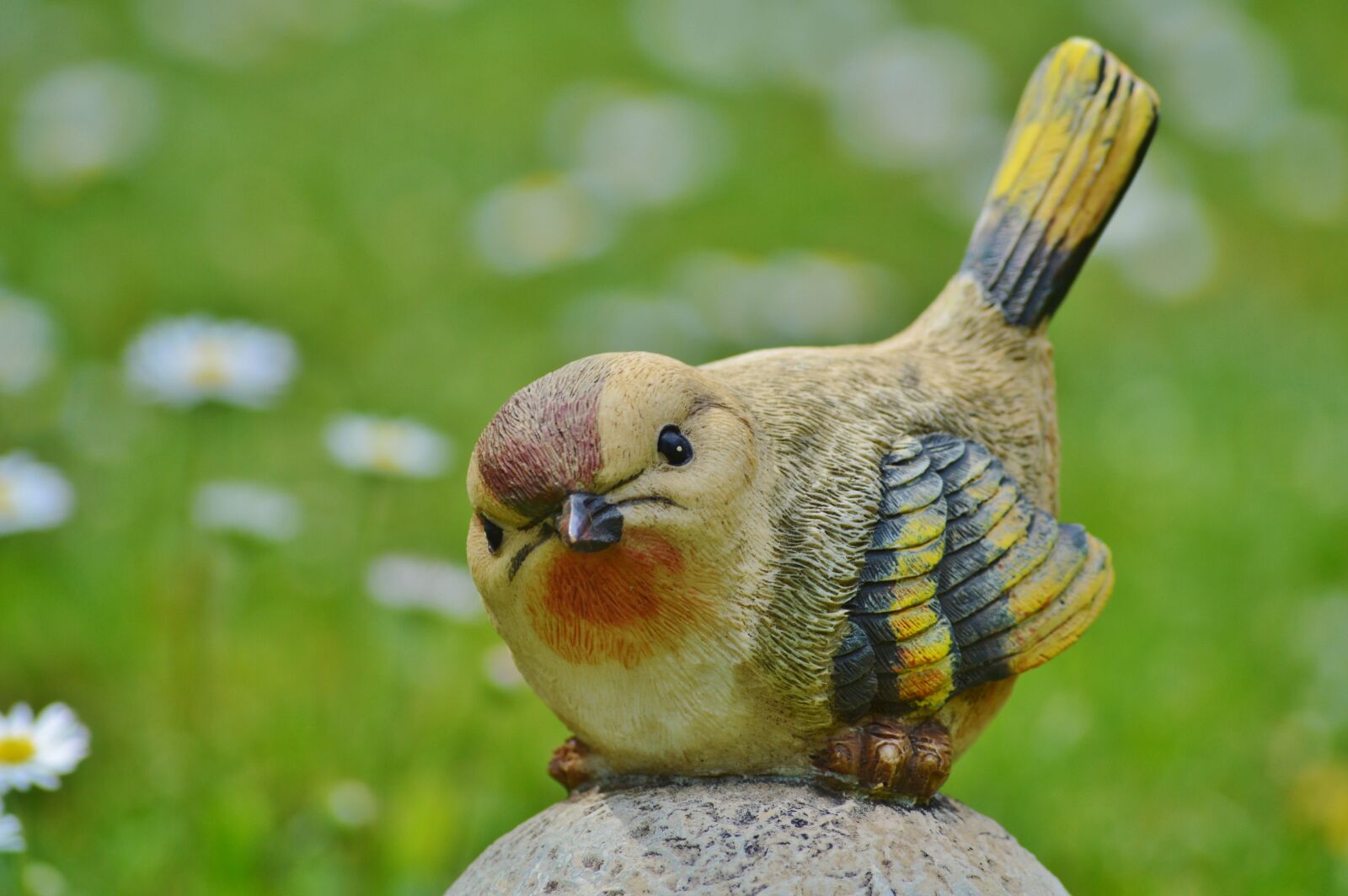 Nikon D3200 sample photo. Bird, sculpture, stone photography