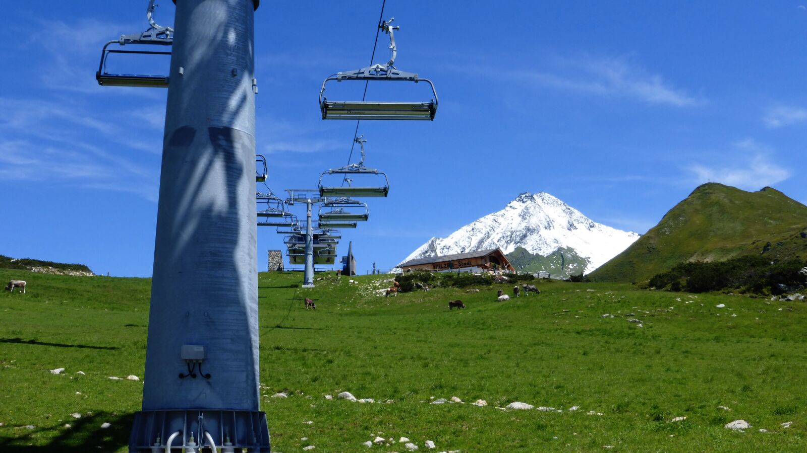 Panasonic Lumix DMC-ZS25 (Lumix DMC-TZ35) sample photo. Austria, mountains, chairlift photography