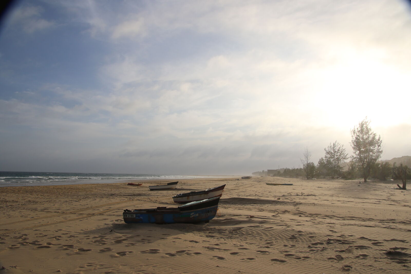 Canon EOS 7D Mark II sample photo. Beach, blue, skies, boat photography