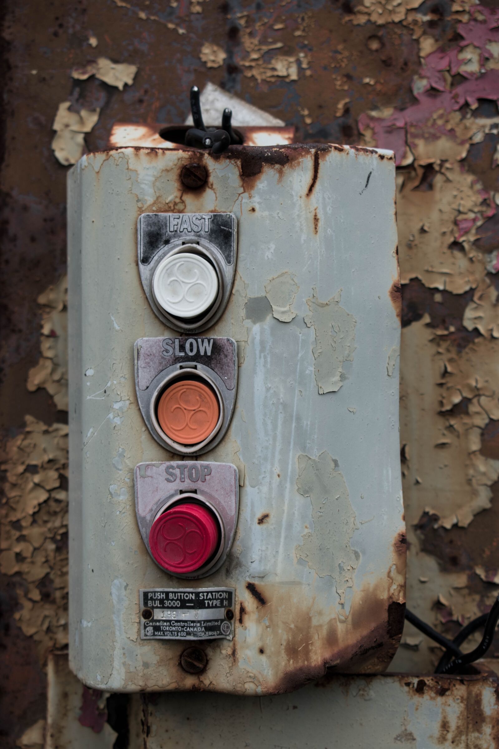 Nikon D3400 sample photo. Buttons, rust, warehouse photography