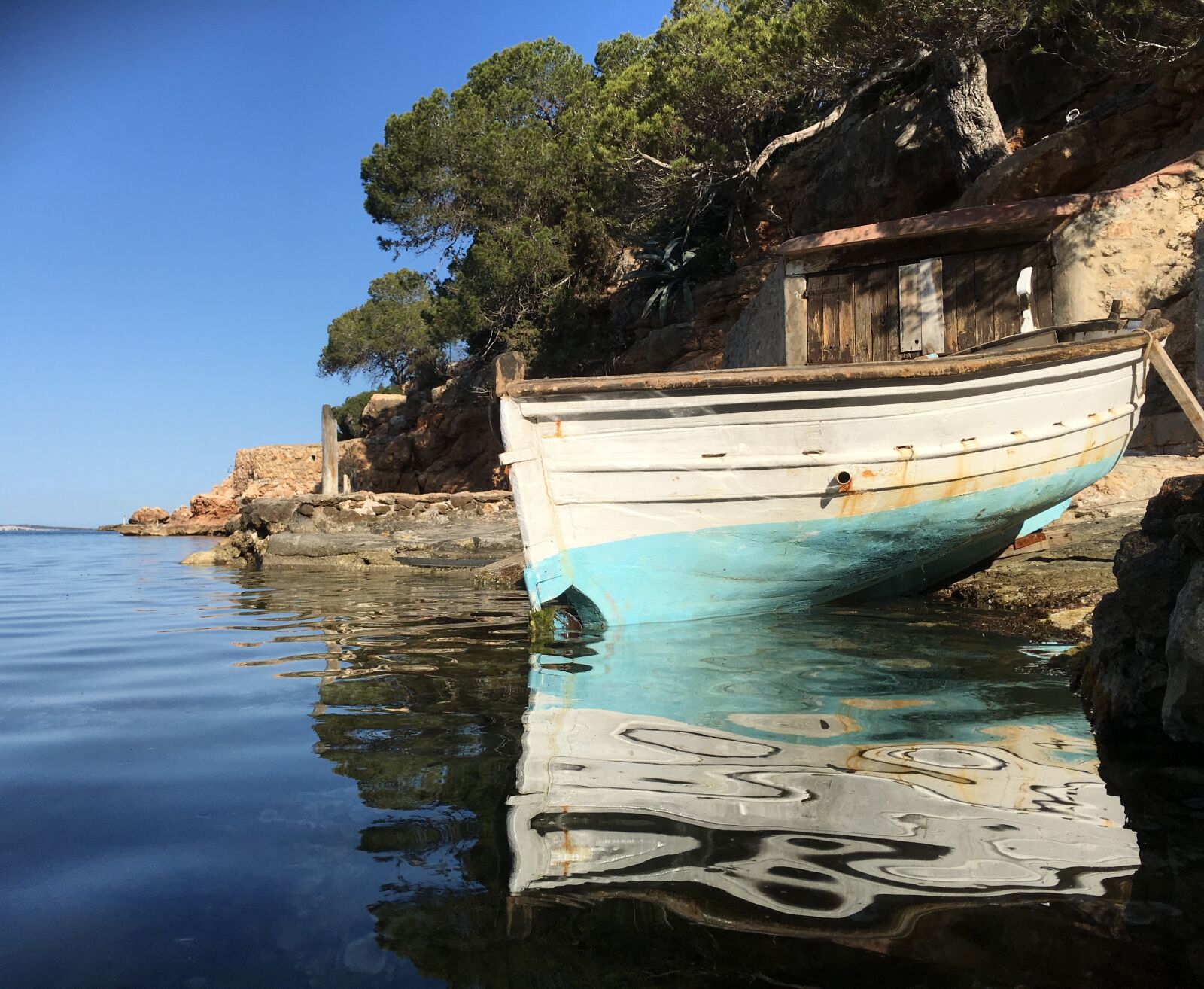 Apple iPhone 6s Plus sample photo. Little boat, beach, ibiza photography