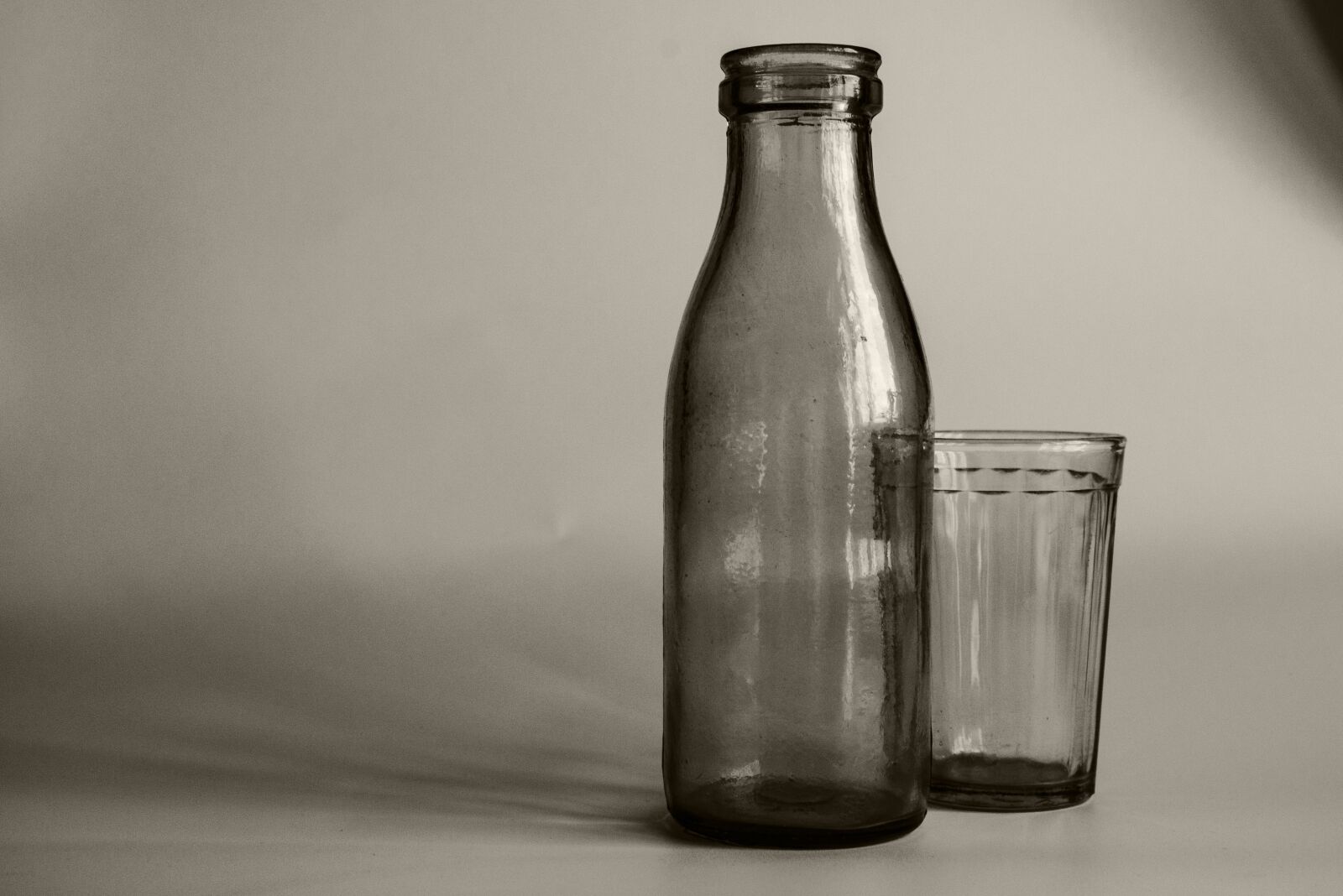 Nikon D5100 sample photo. Glass, bottle, black and photography