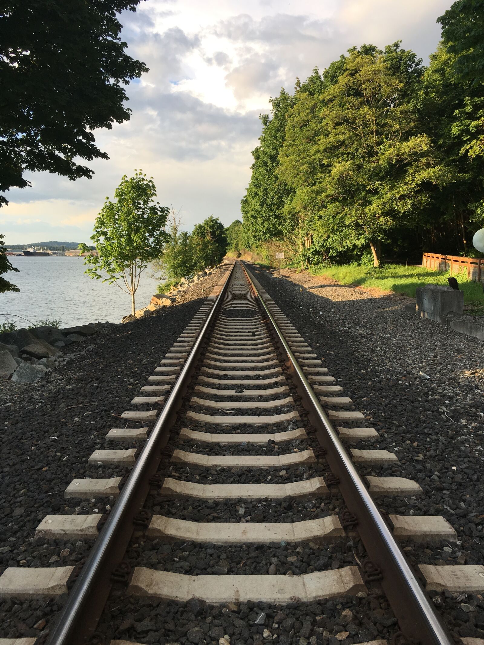 Apple iPhone 6s sample photo. Railroad, train, water photography