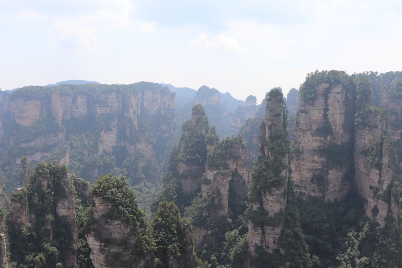 Canon EF-S 18-55mm F4-5.6 IS STM sample photo. Zhangjiajie, trees, mountain photography