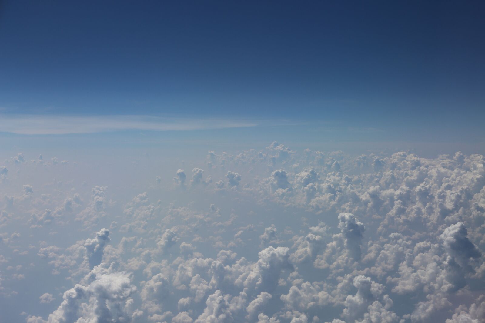 Canon EOS 700D (EOS Rebel T5i / EOS Kiss X7i) sample photo. Clouds, up high, airplane photography