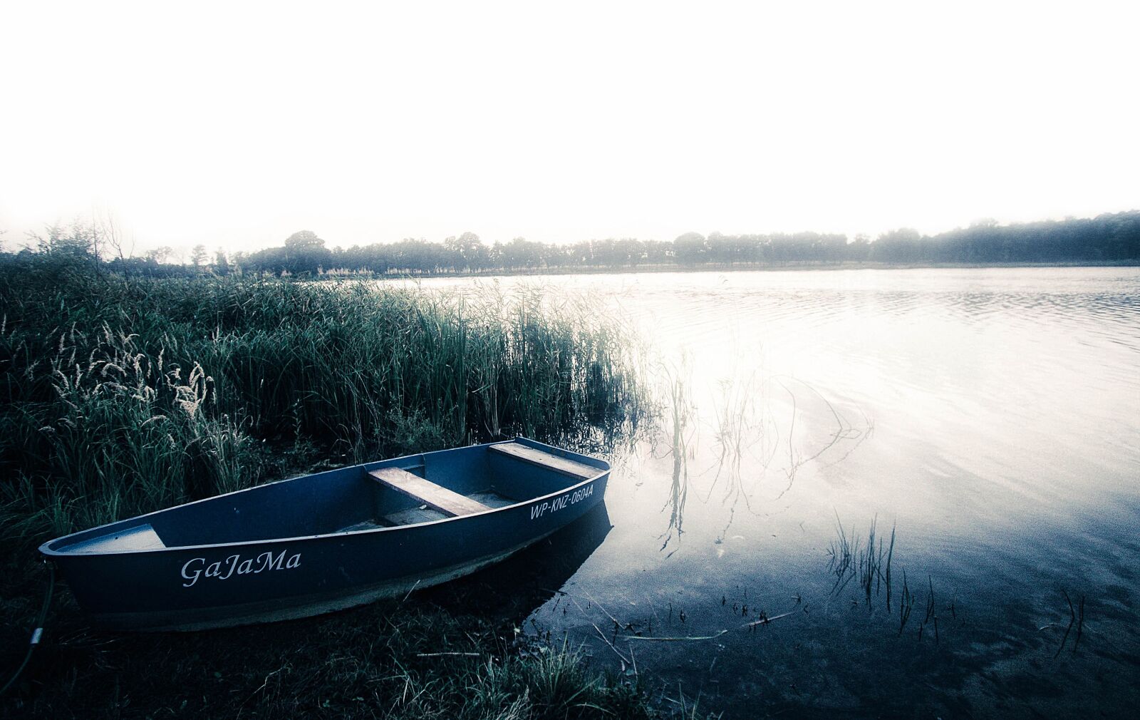 Canon EF-S 10-22mm F3.5-4.5 USM sample photo. Lake, boat, landscape photography
