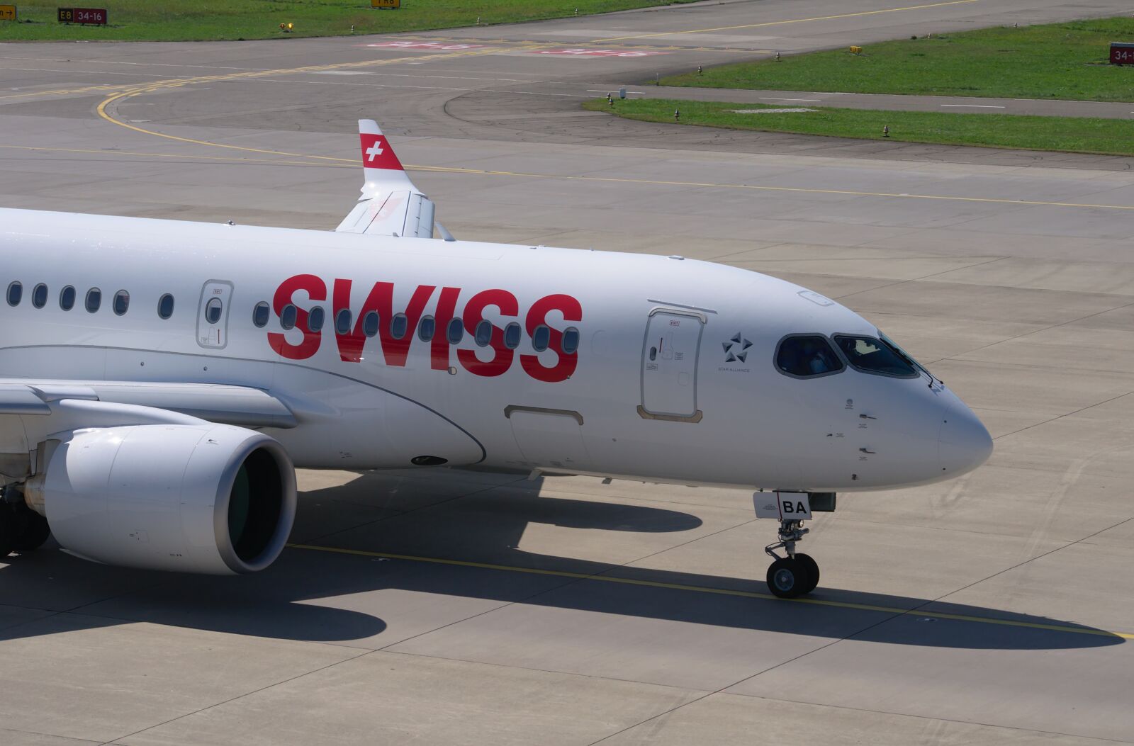 Nikon D300S sample photo. Bombardier cs100, swiss airlines photography
