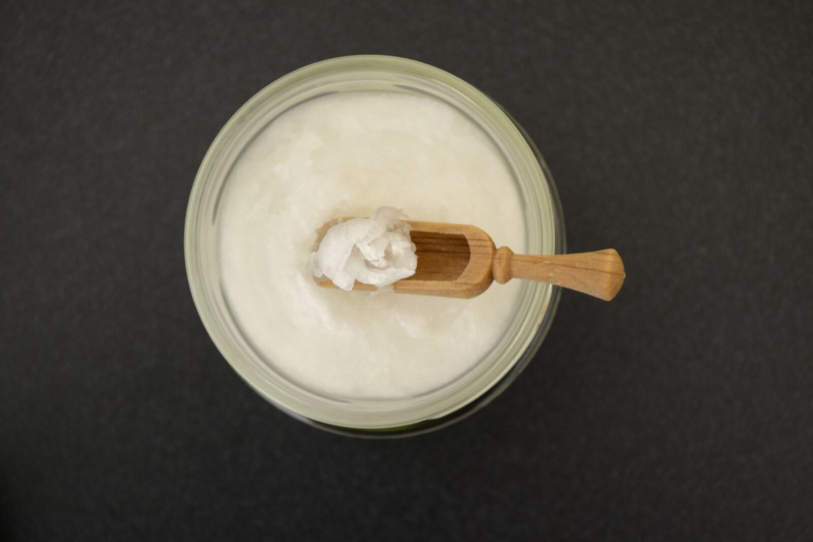 Nikon D3100 sample photo. Coconut oil in jar photography