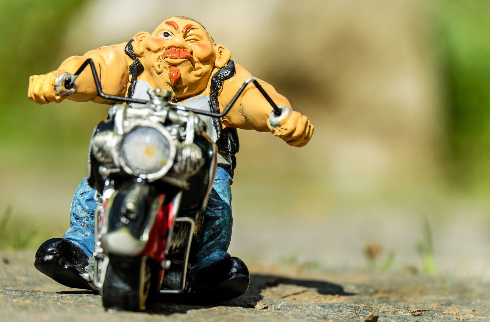 Fujifilm X-T10 + Fujifilm XC 50-230mm F4.5-6.7 OIS sample photo. Biker, figure, motorcycle photography