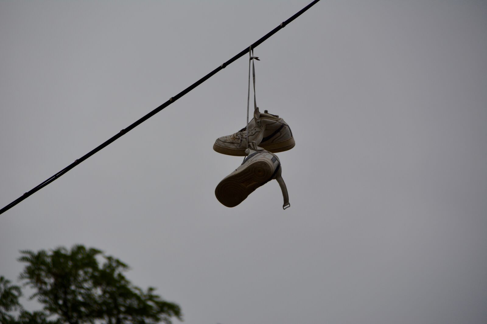Nikon D5200 sample photo. Power line, shoes, nike photography