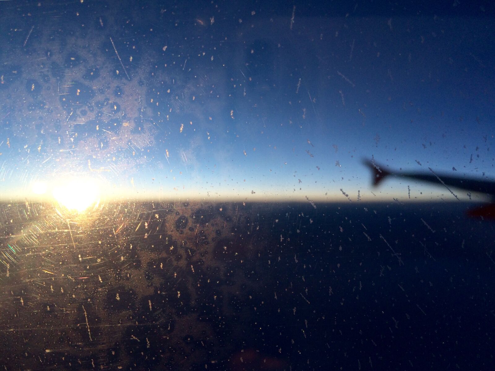 iPhone 5s back camera 4.15mm f/2.2 sample photo. Hublot, plane, sky photography