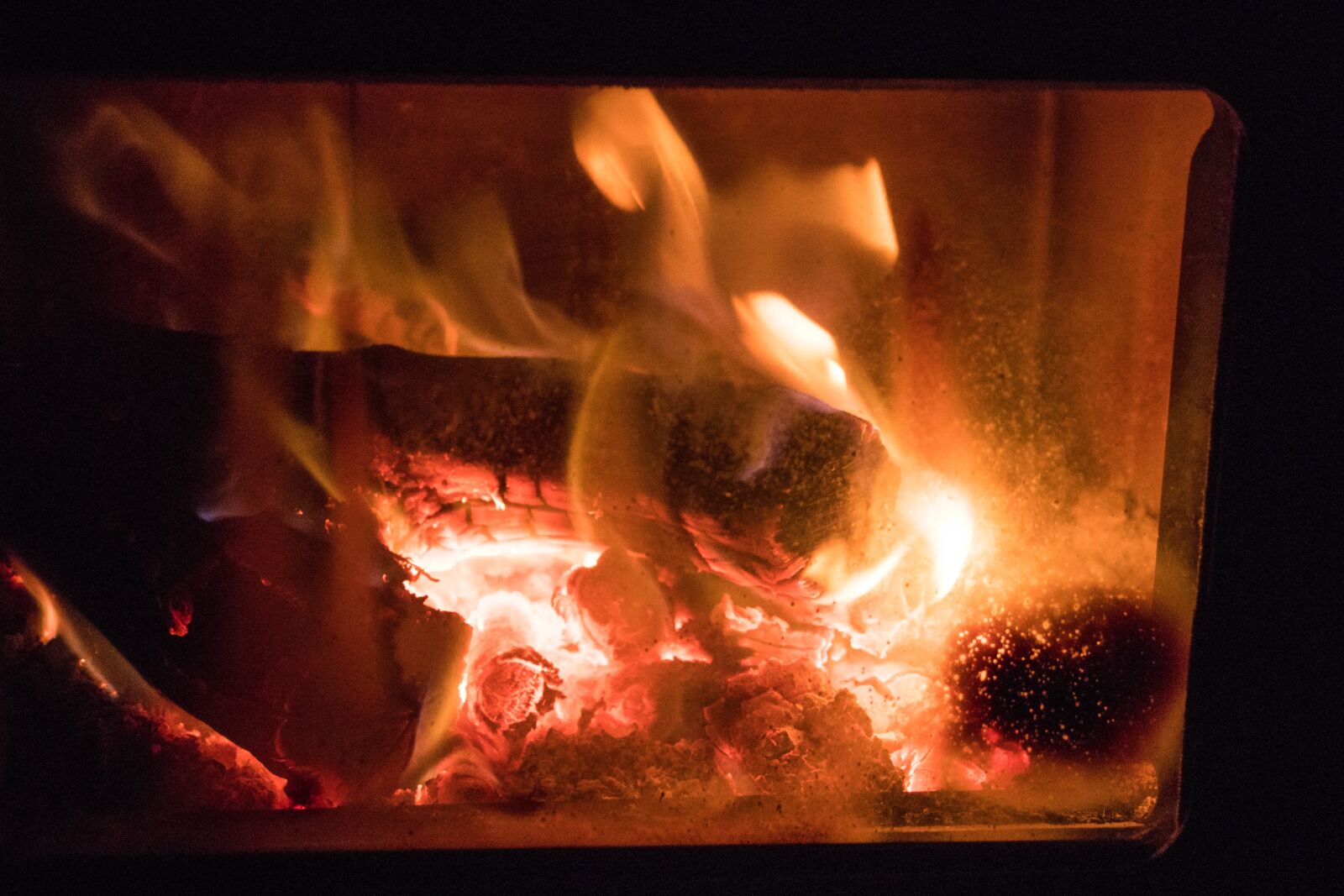 Canon EF-S 18-55mm F4-5.6 IS STM sample photo. Fire, stove, heat photography